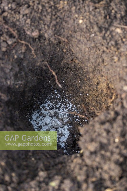 Rootgrow spread across the bottom of the hole for plants to be planted in